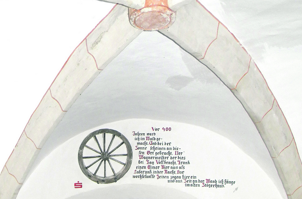 Originalaufnahme Rad mit Inschrift im Stögergasthaus